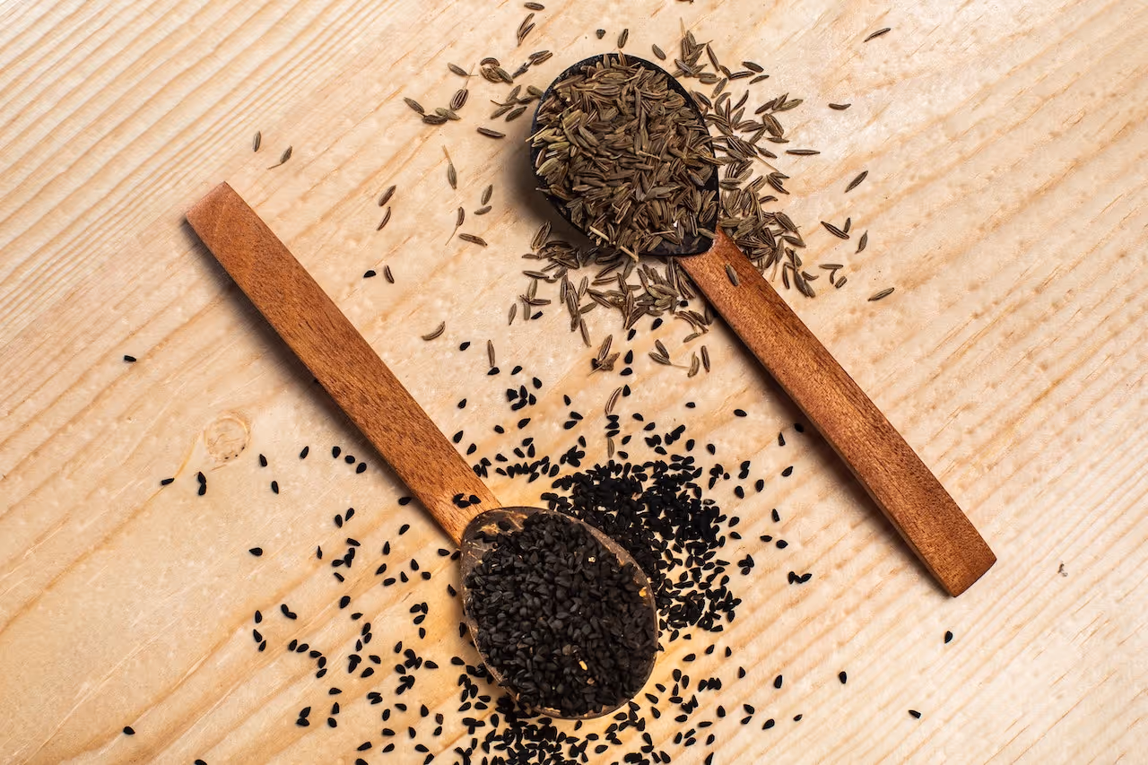 2 wooden spoon-fulls of Black Sesame Seeds (Hei Zi Ma)