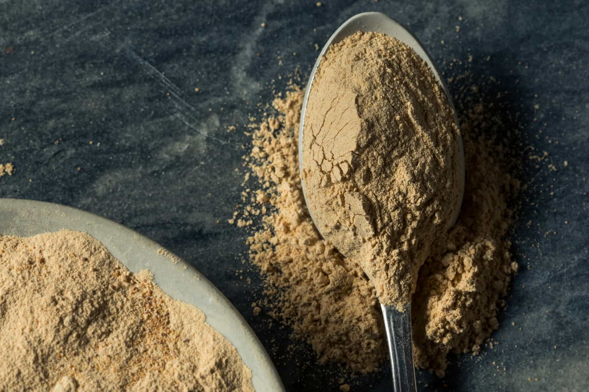 A heaping tablespoon full of Maca Root Powder