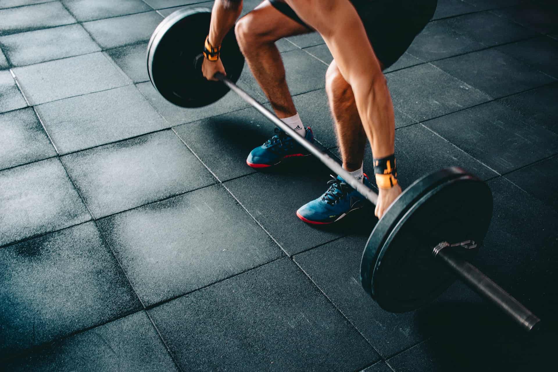 A man doing deadlifts