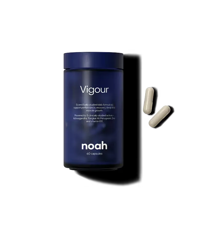 A bottle of Noah Vigour with two capsules