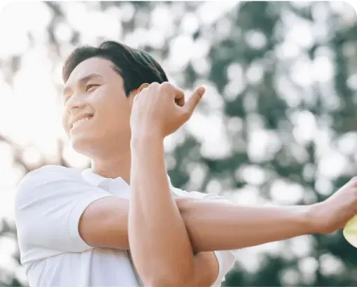 A man stretching outdoors