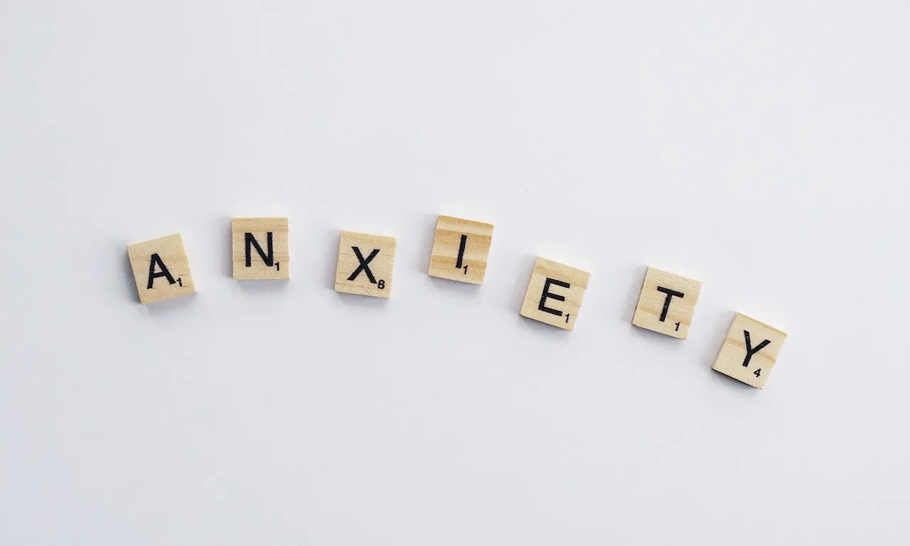 Letter tiles spelling the word anxiety