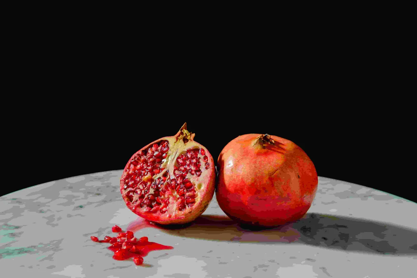 Pomegranates on a table