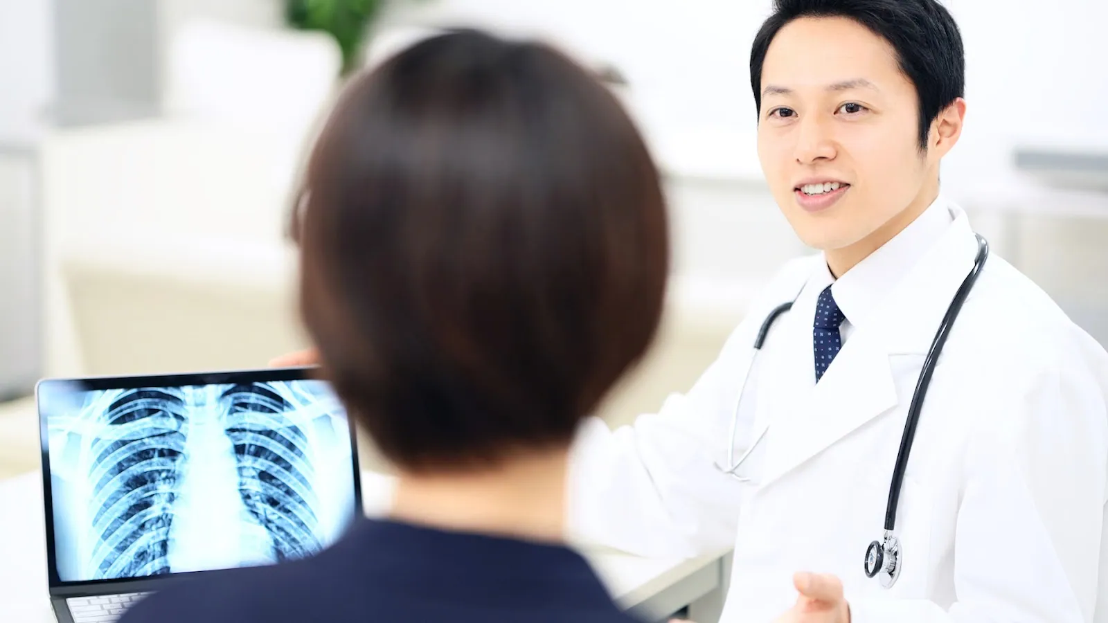 A patient consulting with his doctor